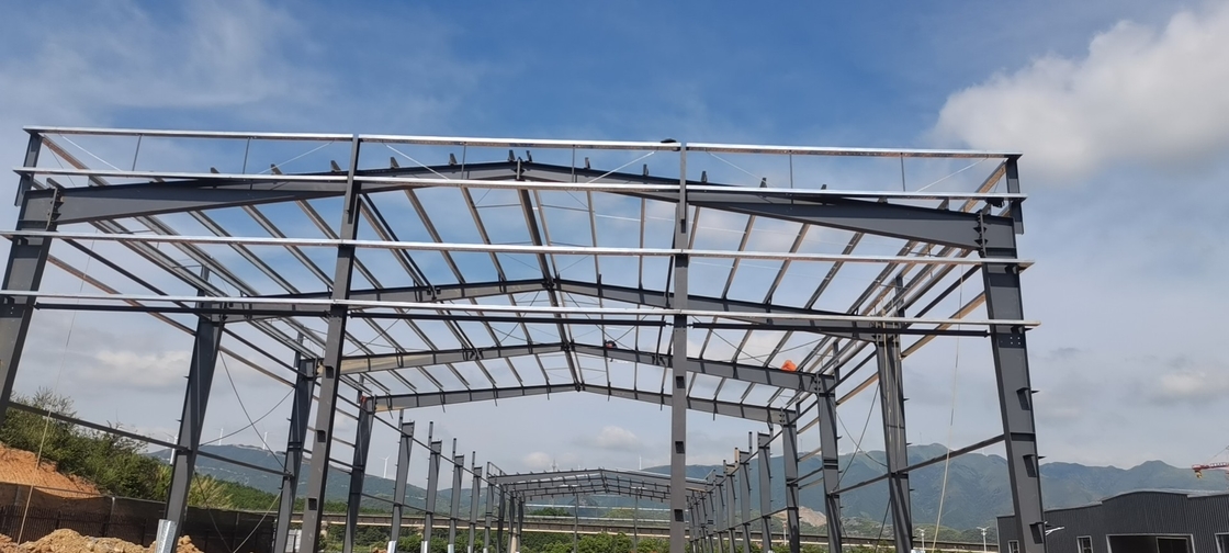 গরম ডাম্প গ্যালভানাইজড প্রিফ্যাব্রিকেটেড স্টিল কাঠামো ধাতু উপাদান গুদাম ভবন কর্মশালার জন্য